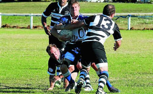 Bob Nichol and Garth Miller put pressure on the opposition. Bob Nichol and Garth Miller put pressure on the opposition.